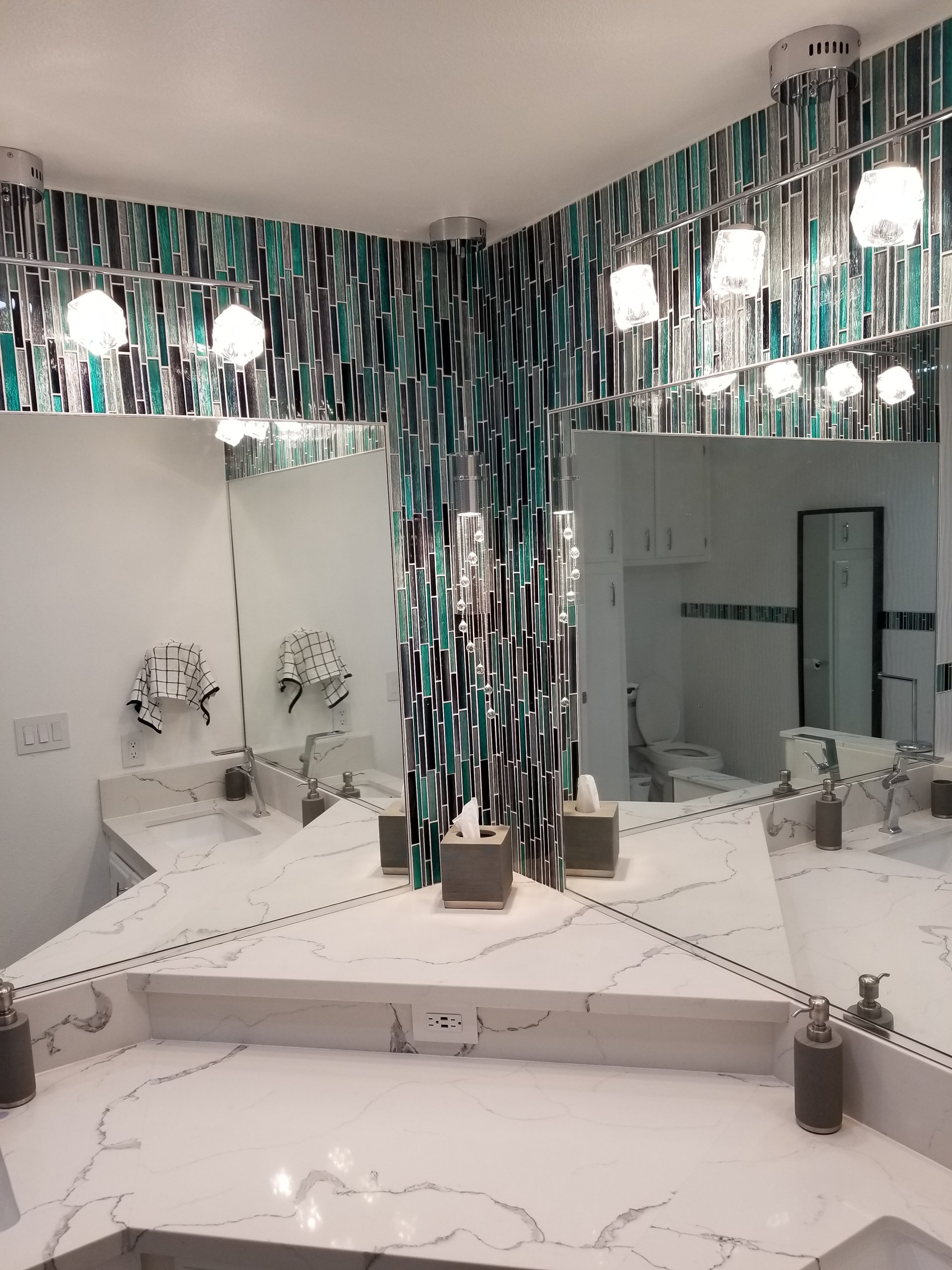 Bathroom remodel with glass shower enclosure in Los Angeles
